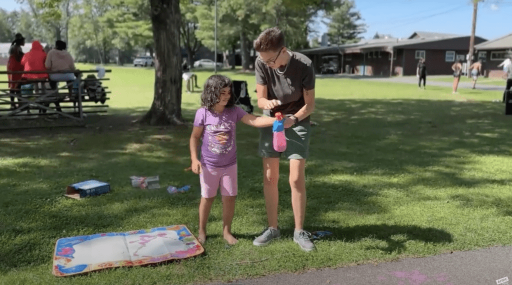 Clementine and her counselor at summer camp